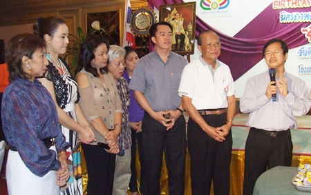 Father Michael Picharn says a birthday prayer.